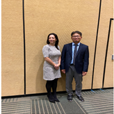 Dr. Doo Sik Kong receives the Mizuho Minimally Invasive Brain Tumor Surgery Award at the CNS 2022 from Dr. Jennifer Moliterno, AANS/CNS Section on Tumors Awards Chair.