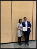 Dr. John Andrews receives the Integra Foundation Award at the CNS 2022 from Dr. Jennifer Moliterno, AANS/CNS Section on Tumors Awards Chair.